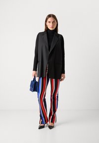 Marc Cain Leggings - Pantaloni - cranberry