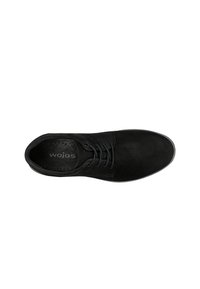Black lace-up shoe made of suede with a smooth finish, featuring round toe, tonal eyelets, and a cushioned insole with branding inside.