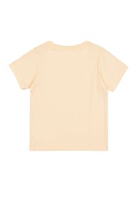 Camiseta de manga corta y cuello redondo en un suave amarillo pastel. Hecha de algodón suave con una textura lisa y sin diseños o acentos visibles.