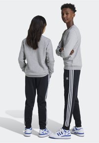 adidas Originals Träningsbyxor - black