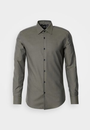 Olijfgroene blouse met lange mouwen, een puntige kraag en donkere knopen, gemaakt van een textuurstof en met een getailleerde pasvorm.