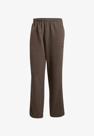 Rjave trenirke z elastičnim pasom, izdelane iz nežne tkanine. Imajo ravno krojenje in majhen logotip na sprednji strani.