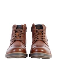 Brown leather ankle boots with a smooth finish, featuring round toe, lace-up design, and contrasting rubber sole with subtle tread.