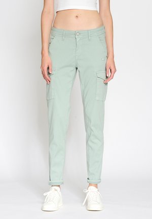 Light green cargo pants with a fitted design, multiple side pockets, rolled cuffs, and a smooth cotton blend texture.