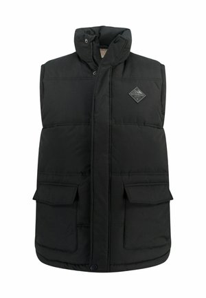 Sort polstret vest med høj krave, frontlukninger med trykknapper og to brystlommer. Har et diamantlogo-patch på venstre side.