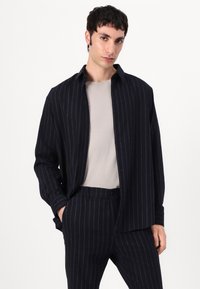 DRYKORN RAMIS - Button down-skjorte - blue