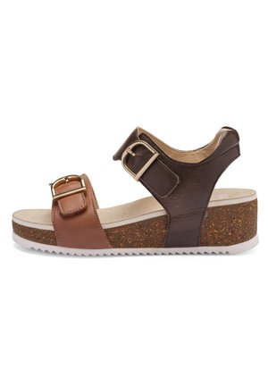 Brown and dark brown wedge sandal with two adjustable gold buckles and cork-textured sole, on white background.