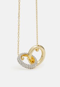 Gouden ketting met onderling verbonden lussen; de ene lus is glad en glanzend, de andere is bezet met kleine, ronde, heldere stenen.
