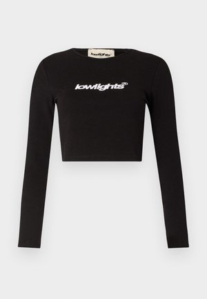 Black cropped long-sleeve t-shirt made of cotton. Features a crew neckline and “lowlights” logo in white across the chest.