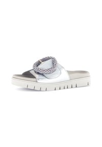 Silver metallic slide sandal with a beaded strap, smooth upper, plush footbed, and ridged white sole for traction.