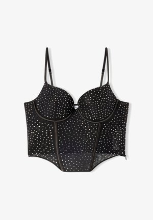 Reggiseno nero con tessuto trasparente, coppe imbottite e motivo a pois argentati. Presenta spalline regolabili e una chiusura con gancio e occhiello sul retro.