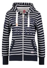 Sweat à capuche zippé rayé bleu marine et blanc avec poches avant, cordons blancs et texte "Superdry Athletic" sur la poitrine, étiquette sur l’ourlet.