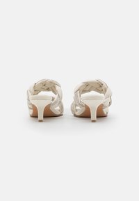 Marco Tozzi BY GUIDO MARIA KRETSCHMER - Heeled mules - cream comb