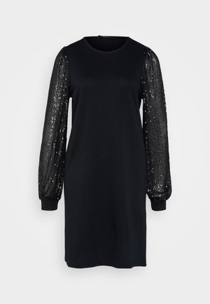 Black dress featuring a simple body and long, puffed sleeves adorned with black sequins, creating a textured contrast in design.