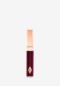 Lip product in a tube with a rose gold cap, deep burgundy liquid inside, clear base, and a diamond logo on the side.