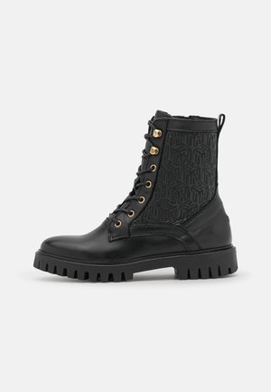 Stivaletti stringati - black