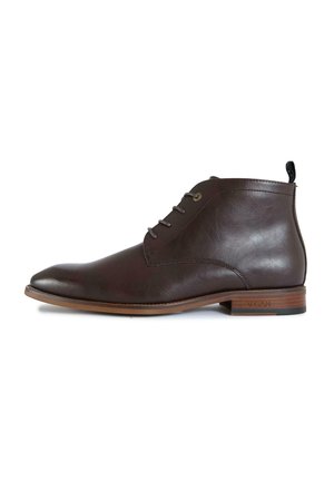 Brown leather ankle boot with lace-up front, wooden sole with slight heel, and pull tab at back, shown from the outer side.