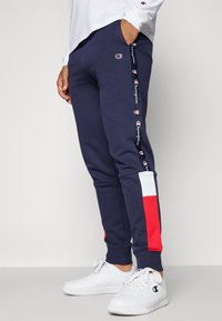 Champion RETRO SPORT CUFF PANTS - Pantalones deportivos - dark blue