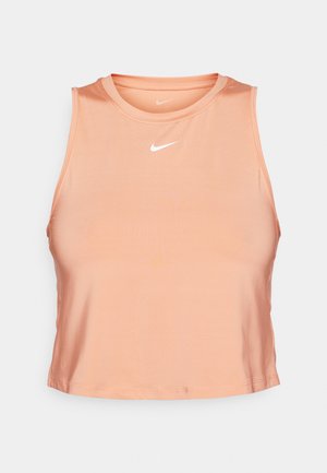 Lühem pehme virsiku värvi kangast tank top, sileda tekstuuriga, ümara kaelusega ja väikese valge Nike logoga rinna keskosas.