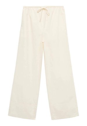 Cremefarvede bukser med vidde, elastisk talje og snøre fortil, med brede manchetter ved forneden.