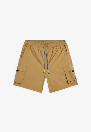 Pantaloni cargo in tessuto color khaki con cintura elastica, cordino con dettagli verdi e tasche laterali per riporre gli oggetti.