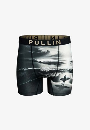 Boxer briefs noirs avec un motif graphique de vagues océaniques et un surfeur en silhouette, dotés d'une ceinture noire avec l'inscription « PULLIN » en lettres dorées.
