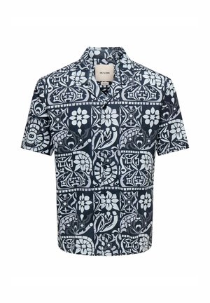 Košulja kratkih rukava s gumbima, s crno-bijelim cvjetnim i geometrijskim uzorkom, klasičnim ovratnikom i gumbima sprijeda.