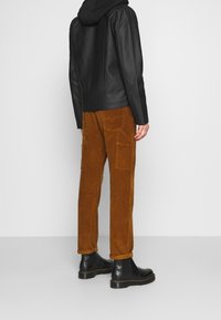 Nominal Veste en similicuir - black