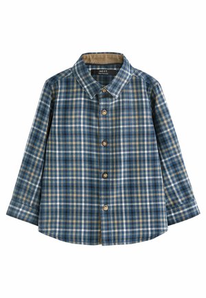 Chemise à manches longues à carreaux bleu, beige et blanc avec col, boutons sur le devant et ourlet arrondi.