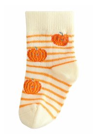 Cream-colored sock with orange stripes and embroidered pumpkins. Soft, ribbed material with a rounded toe and minor decorative accents.