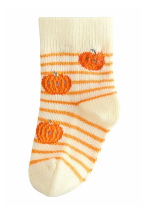 Kermanvärinen sukka, jossa on oransseja raitoja ja brodeerattuja kurpitsoja. Pehmeä, ribbed-materiaali, pyöreä varvas ja pieniä koriste-elementtejä.
