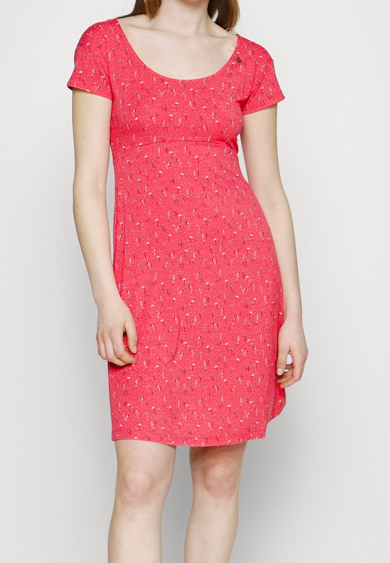 Ärmelloses Kleid mit Rundhalsausschnitt aus leuchtend pinkem Stoff mit floralem Muster. Es hat ein tailliertes Oberteil und einen ausgestellten Rock.