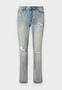 CHITCH PUNK THRASHED - Pieguloša piegriezuma džinsi - light blue denim