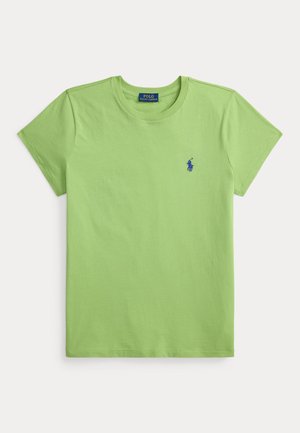 Vihreä puuvillainen T-paita, jossa pyöreä pääntie ja lyhyet hihat. Vasemmassa rinnassa pieni sininen logo. Pehmeä tekstuuri, rento istuvuus.