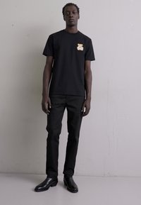 MOSCHINO Camiseta estampada - black