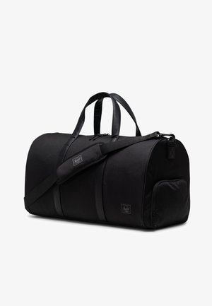 Borsa a duffle nera realizzata in tessuto resistente con dettagli in pelle, dotata di manici doppi, tracolla regolabile e una tasca laterale con zip.