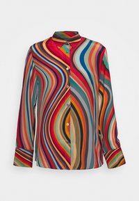 Chemise à manches longues boutonnée avec col pointu, présentant des rayures ondulées multicolores et vives en rouge, bleu, vert, orange et beige.