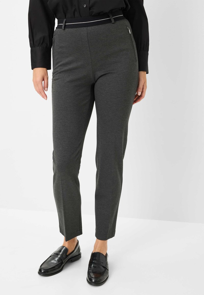 Gray, tailored trousers with a smooth texture, slim fit, and a contrasting black waistband featuring a subtle stripe. Accented with pockets.