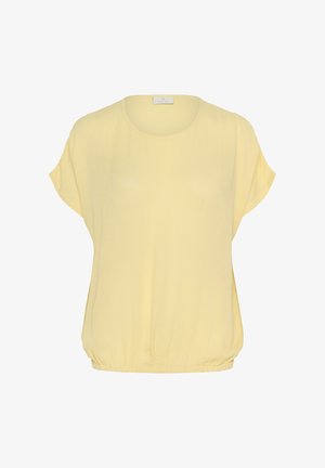 Tricou cu mânecă scurtă, gât rotund, dintr-un material moale de culoare galben deschis. Prezintă o croială lejeră, cu o tivă strânsă pentru un siluetă relaxată.