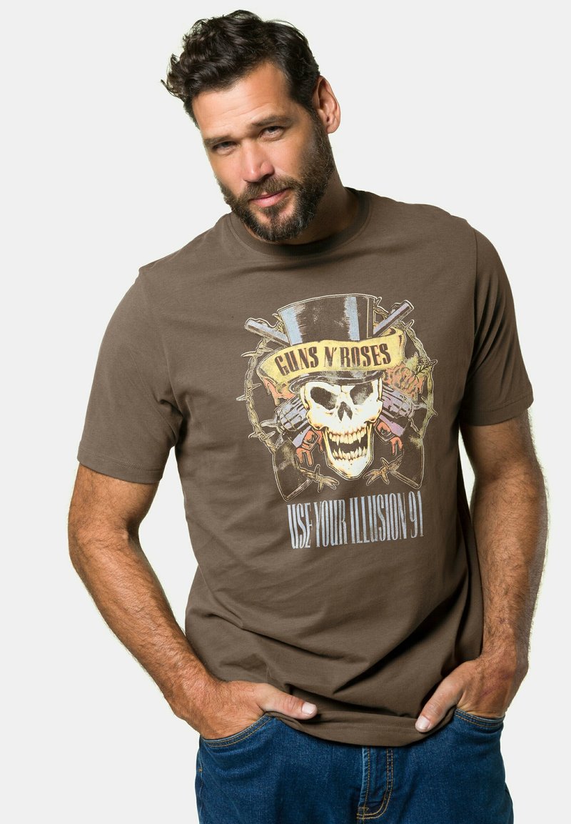 Brun bomulds T-shirt med et grafisk design af et kranium med en cylinderhat, våben og teksten "GUNS N' ROSES" samt "USE YOUR ILLUSION 91."