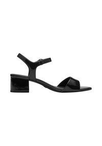 Sandalias de tacón de cuero negro con un diseño de tiras, una correa ajustable en el tobillo y un tacón bajo estilo bloque. Acabado suave y brillante.