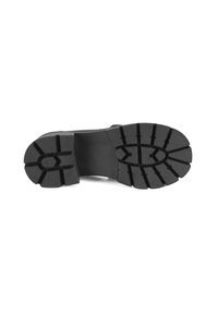 Zwarte rubberen schoenen met een diepe profiel, met een afgeronde vorm en duidelijke randen voor grip. Vlakke, solide constructie zonder patronen.