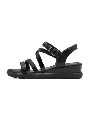 Sandalo con zeppa nero da donna con tre sottili cinturini, fibbia alla caviglia e suola imbottita su sfondo bianco.