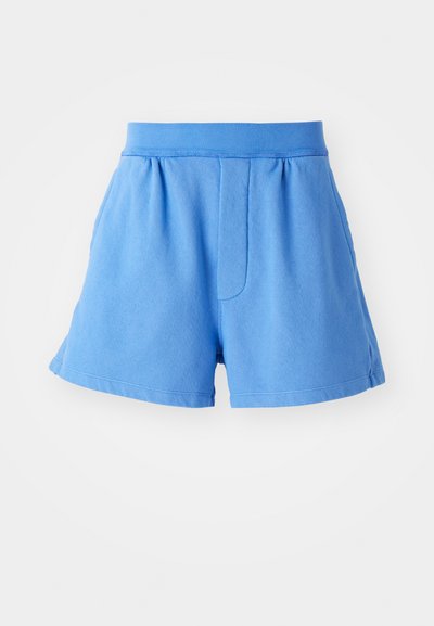Light blue cotton shorts with an elastic waistband, side pockets, a smooth texture, and a relaxed fit that flares slightly at the hem.