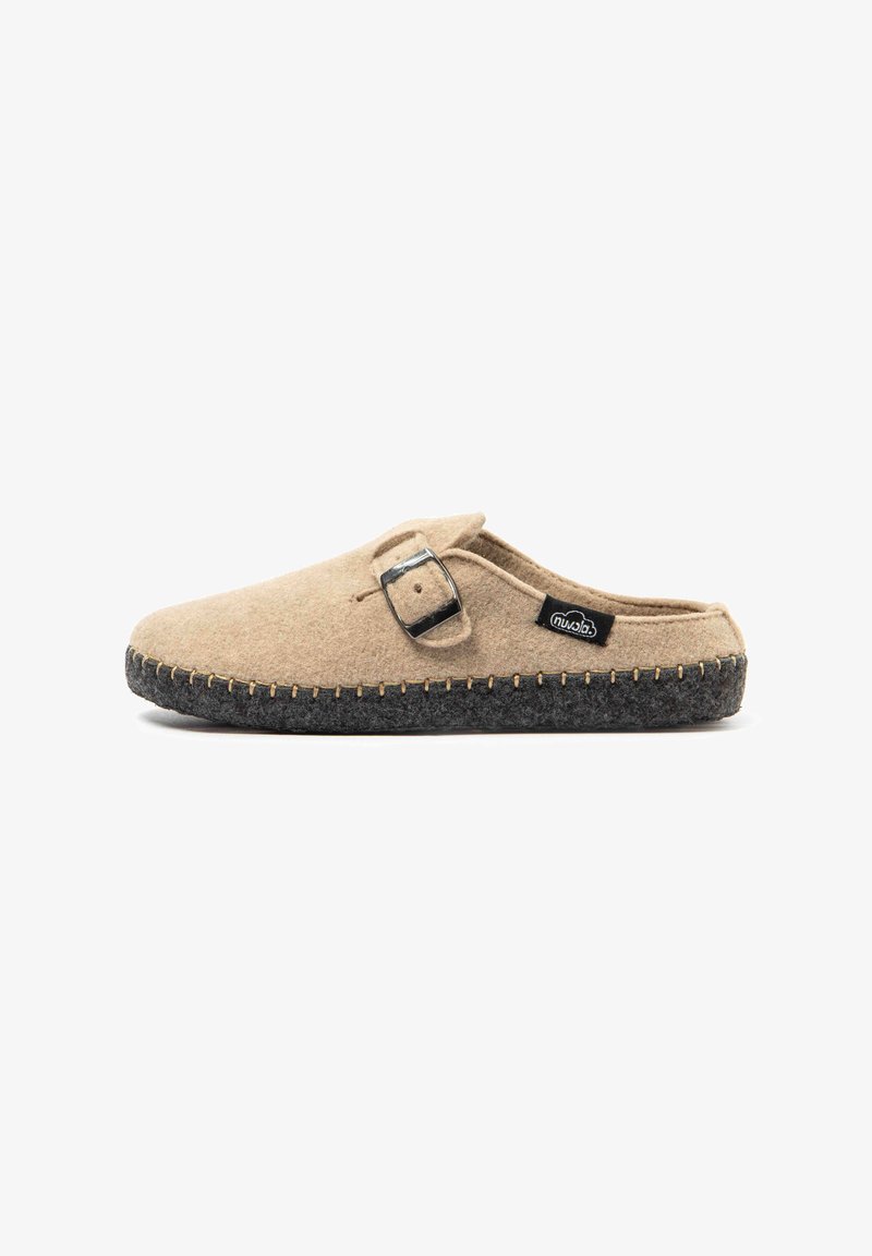 Felt slip-on slipper in light beige with black woolen sole, featuring a silver adjustable buckle and contrasting stitching detail.