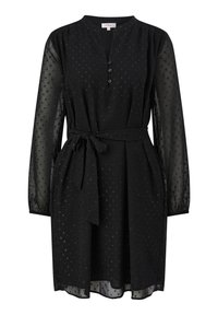 Robe noire longueur genoux avec manches longues transparentes, petits points texturés, ceinture en tissu nouée à la taille et col à trois boutons.