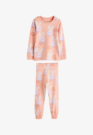 Dziecięca piżama w kolorze brzoskwiniowym z długimi rękawami i spodniami, z wzorem białych króliczków z kwiatowymi uszami oraz małymi różowymi kwiatkami.