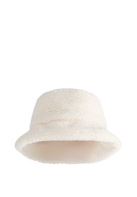 Krem-bijela lažna krzna kapa u obliku kante s mekanom, teksturiranom površinom i širokim, lepršavim obodom. Dizajnirana za toplinu i udobnost.