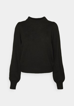 Pull en maille noir avec col montant, manches longues bouffantes et ourlet court. Tissu texturé avec une finition douce.
