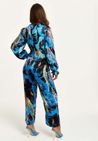 Liquorish ABSTRACT PRINT WITH RUCHED FRONT  - Jumpsuit - multi coloured